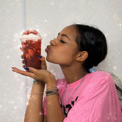 Customer Enjoying Fresh Drink at BB's Bagels Alpharetta